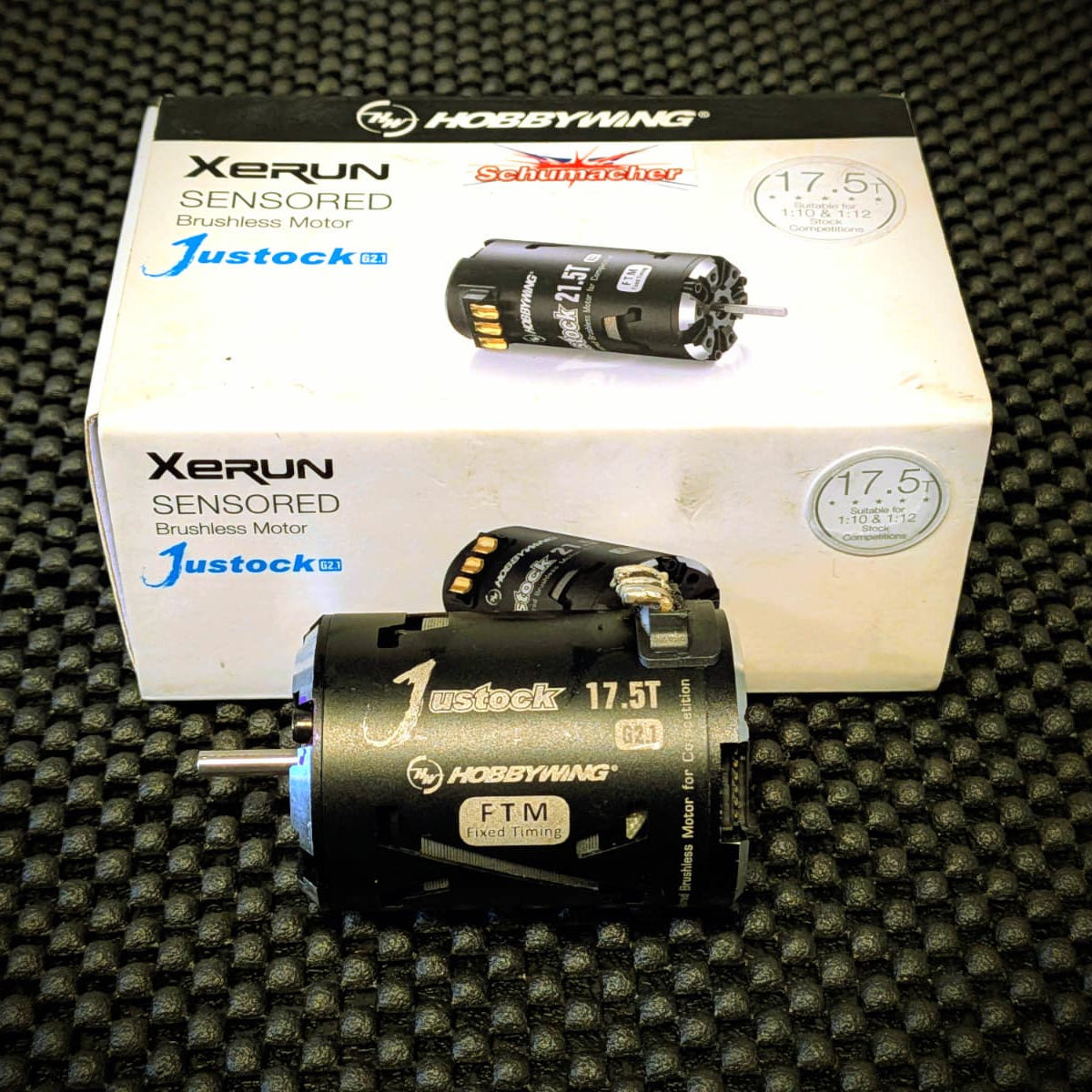 Hobbywing Xerun sensored brushless motor with packaging on a textured black surface